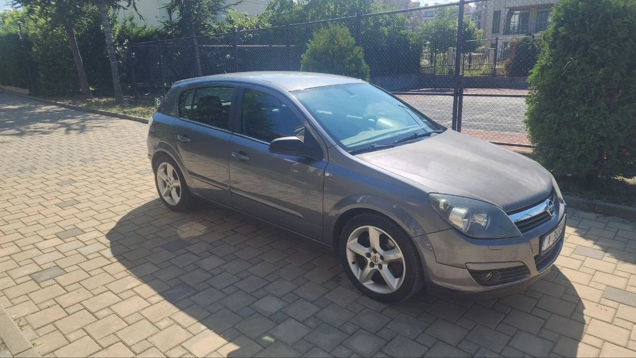Opel Astra, снимка 7 - Автомобили и джипове - 55424954