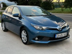 Toyota Auris 1.8 HYBRID/Сервизна история/Автомат/Нова батерия, снимка 2