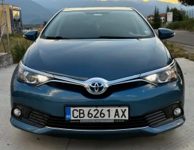 Toyota Auris 1.8 HYBRID/Сервизна история/Автомат/Нова батерия, снимка 1