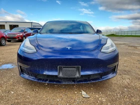 ������ Tesla Model 3