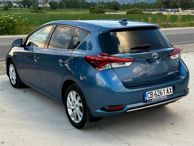 Toyota Auris 1.8 HYBRID/Сервизна история/Автомат/Нова батерия, снимка 6 - Автомобили и джипове - 48963346