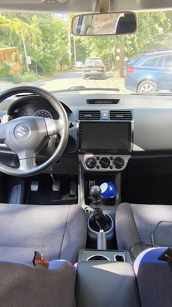 Suzuki Swift 1.3 VVT 92 к.с., снимка 13 - Автомобили и джипове - 55464632