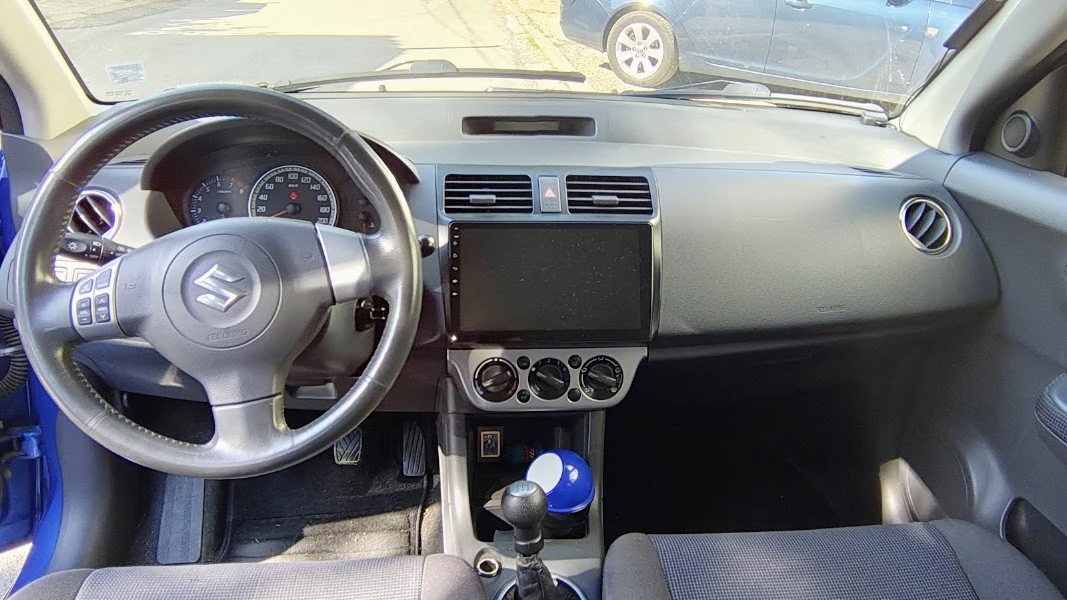 Suzuki Swift 1.3 VVT 92 к.с., снимка 14 - Автомобили и джипове - 55464632