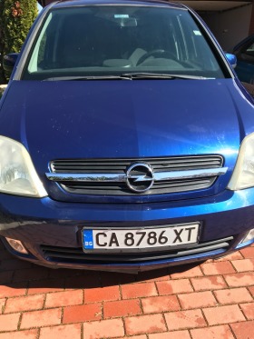 Opel Meriva, снимка 12 - Автомобили и джипове - 45234437