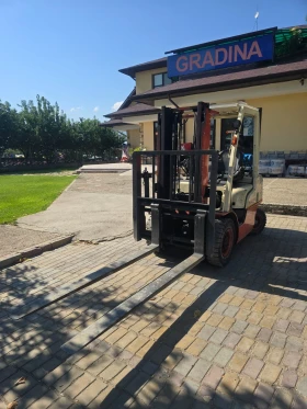 Мотокар Nissan Бензин, LPG, 2.5ton, движение на вилиците, снимка 1