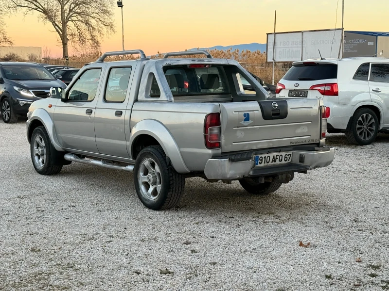 Nissan Navara 2, 5 TDI, снимка 7 - Автомобили и джипове - 48339420