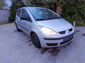Mitsubishi Colt   - 1999 лв. / 1022.07 € - 78617783 7