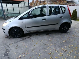 Mitsubishi Colt   - 1999 лв. / 1022.07 € - 78617783 2