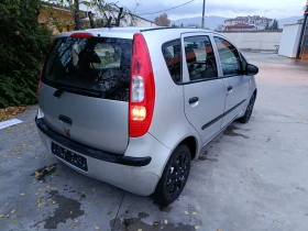 Mitsubishi Colt   - 1999 лв. / 1022.07 € - 78617783 3