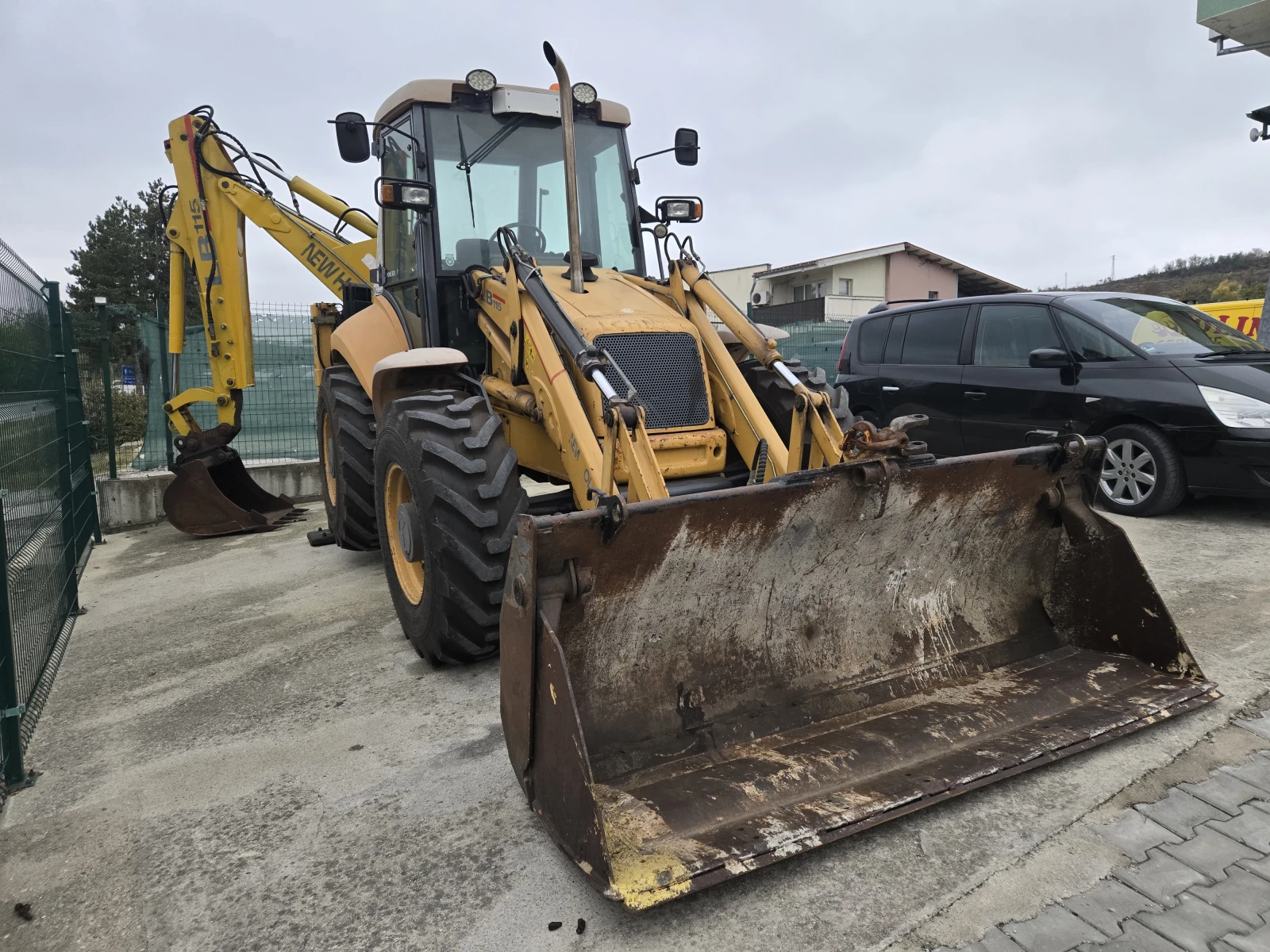 Багер New Holland LB 115-4ps