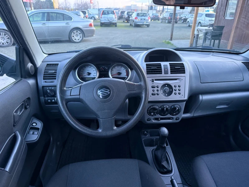 Suzuki Ignis 1.3, снимка 9 - Автомобили и джипове - 52735590