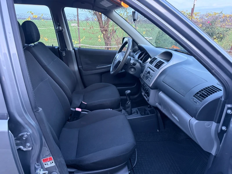 Suzuki Ignis 1.3, снимка 11 - Автомобили и джипове - 52735590