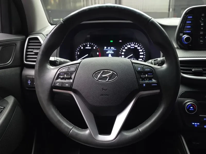 Hyundai Tucson Diesel 2.0 4Wd Modern, снимка 13 - Автомобили и джипове - 56304462