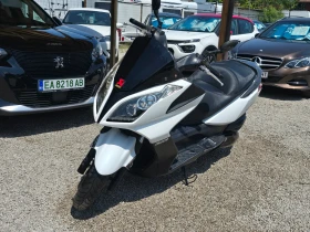 ������ Kymco Downtown