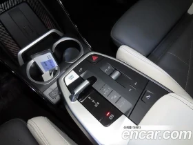 BMW iX1, снимка 12