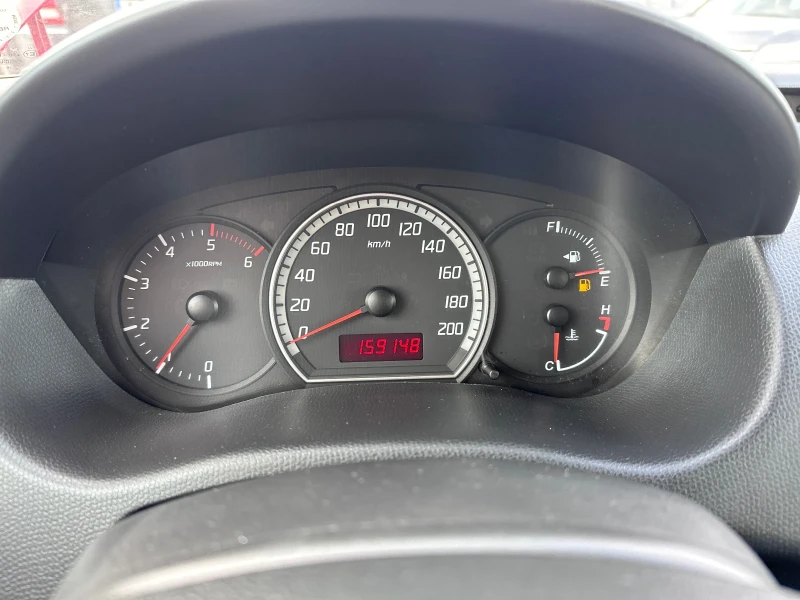 Suzuki Swift 1.3DDiS - КЛИМАТИК, снимка 15 - Автомобили и джипове - 48770059