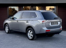 Mitsubishi Outlander - 4x4 - Xenon - Сменени вериги - 2.2D - 7 местен -, снимка 4