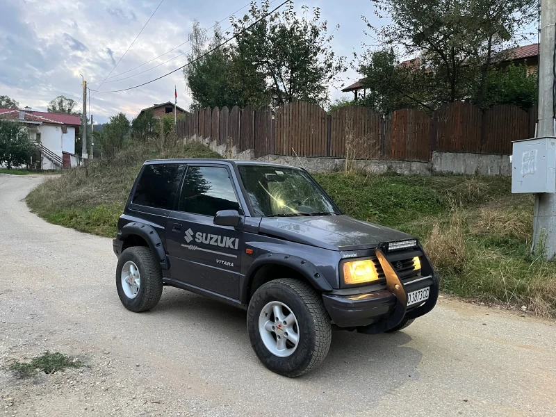 Suzuki Vitara 1.6 газ, снимка 10 - Автомобили и джипове - 48637695