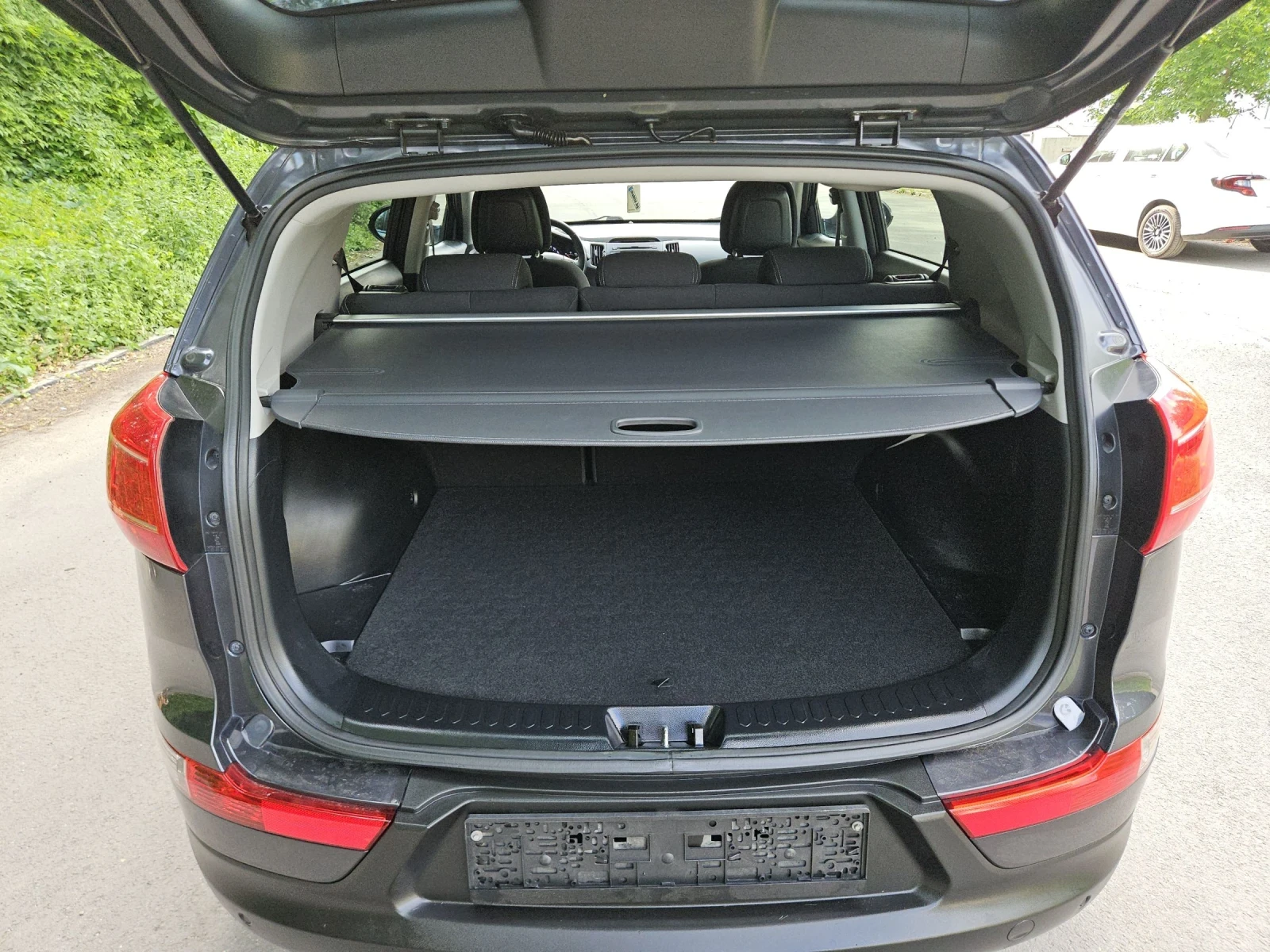 Kia Sportage 1.6i---xenon, снимка 10 - Автомобили и джипове - 54721734