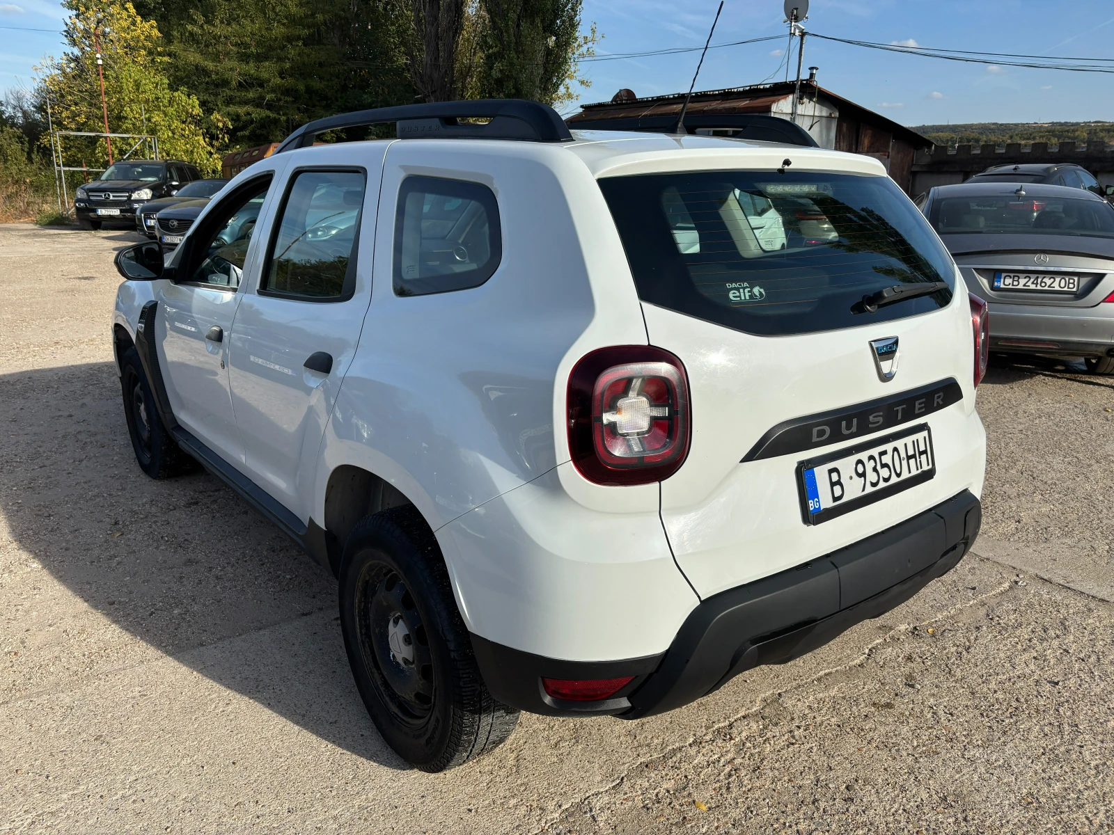 Dacia Duster 1.6i 4X4, снимка 5 - Автомобили и джипове - 56328668