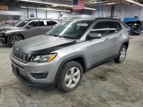 ������ Jeep Compass