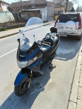 Suzuki Burgman AN 400 K1 - изображение 1