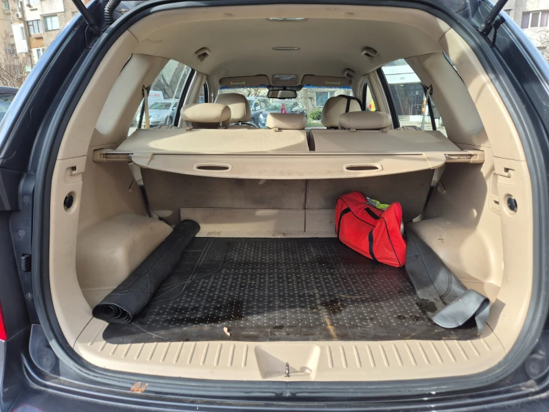 Kia Carens 2.0 CRDi, снимка 11 - Автомобили и джипове - 52636073