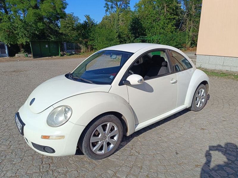 VW New beetle, снимка 1 - Автомобили и джипове - 46279357