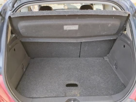 Opel Corsa 1.2 16v 75hp Клима Мулти волан Халогени Уникат , снимка 15