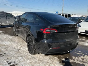 Tesla Model Y LONGE RANGE* 4X4* 360 КАМЕРА* ПАНОРАМА - 22800 € / 44592.92 лв. - 99610371 5