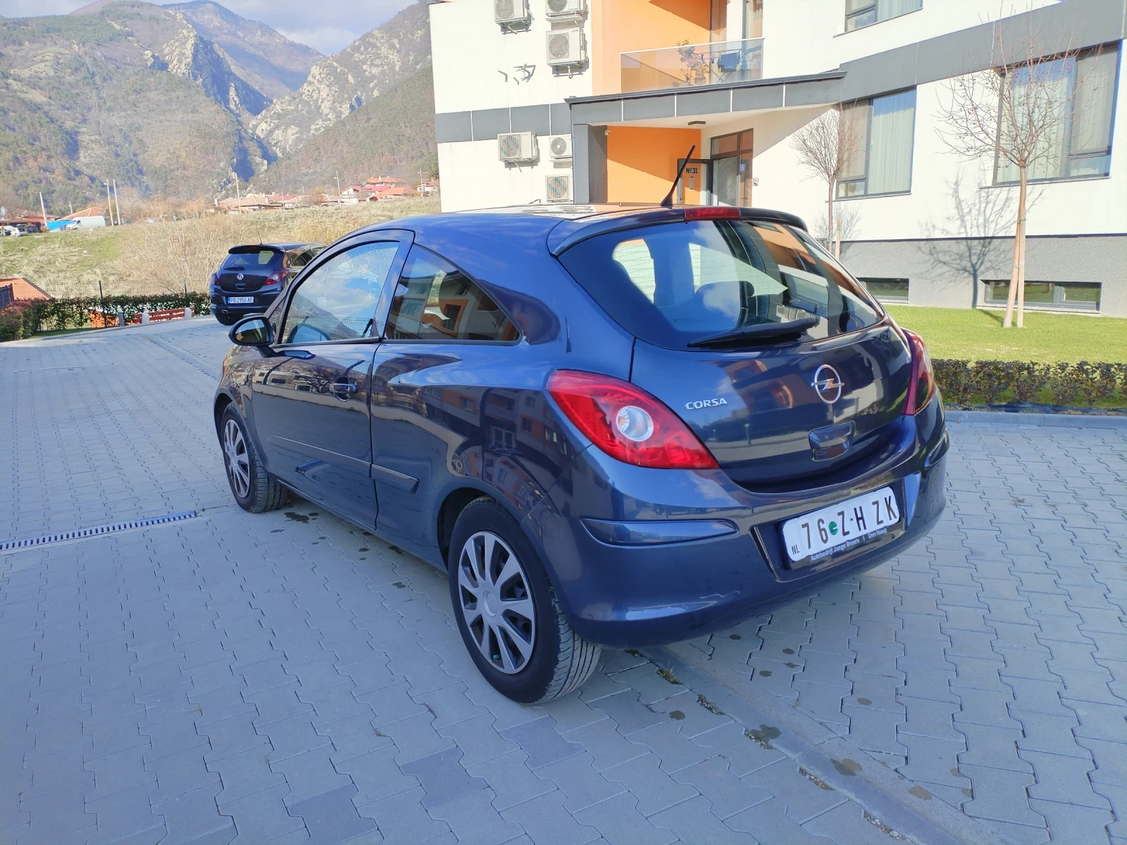 Opel Corsa 1.2 16v 75hp Клима Мулти волан Халогени Уникат  - изображение 5