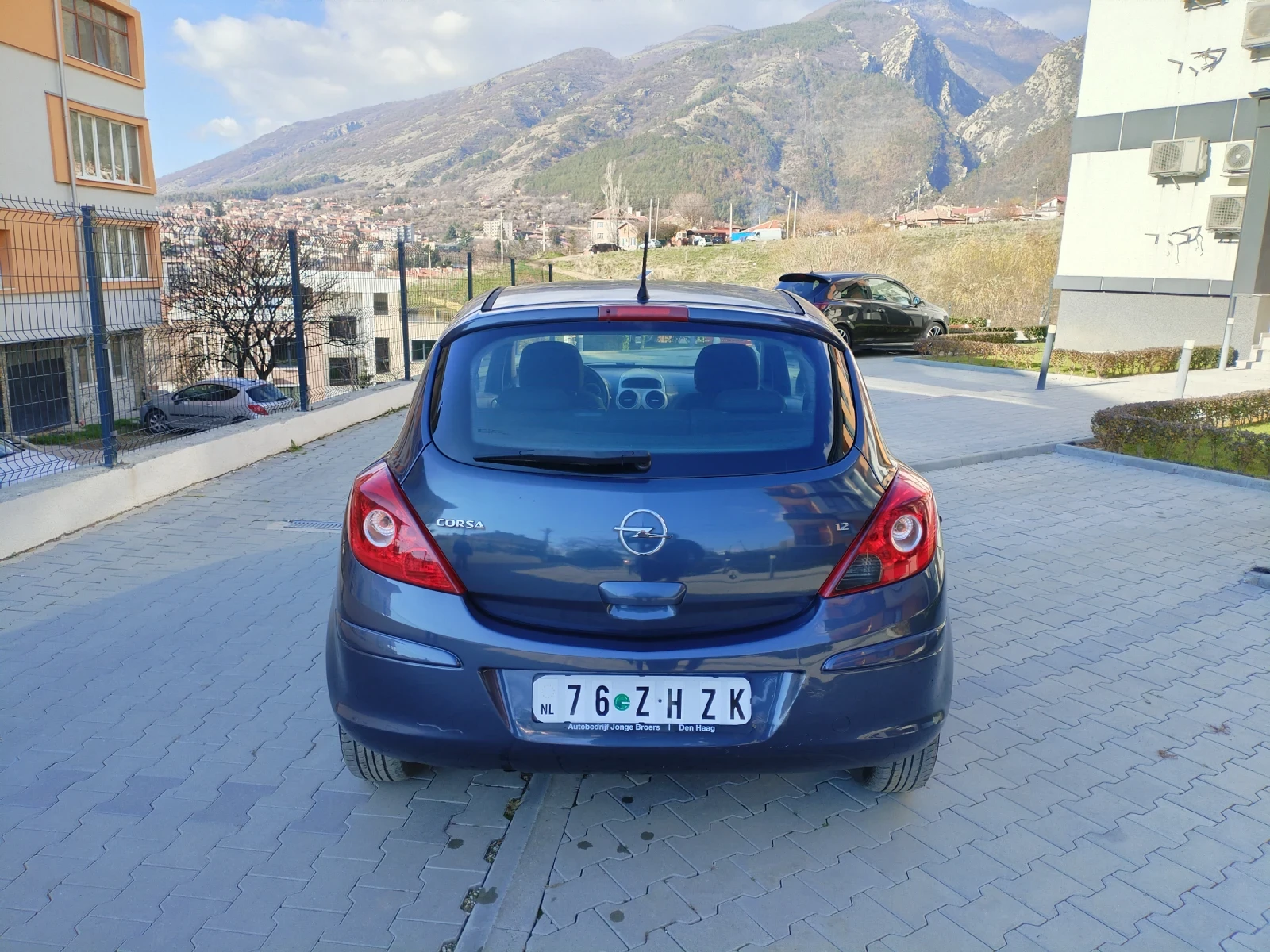 Opel Corsa 1.2 16v 75hp Клима Мулти волан Халогени Уникат  - изображение 7