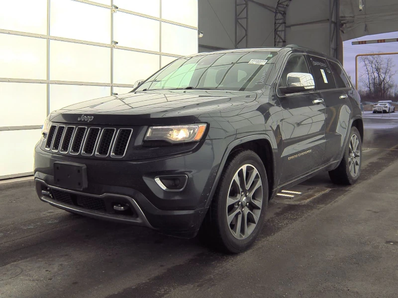 Jeep Grand cherokee ОVERLAND 5.7 HEMI* Обдух* М.Точка* 8ZF* Пано* , снимка 1 - Автомобили и джипове - 49065648