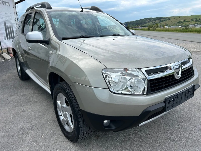 Dacia Duster 1.6i Laureate, снимка 3 - Автомобили и джипове - 41001950