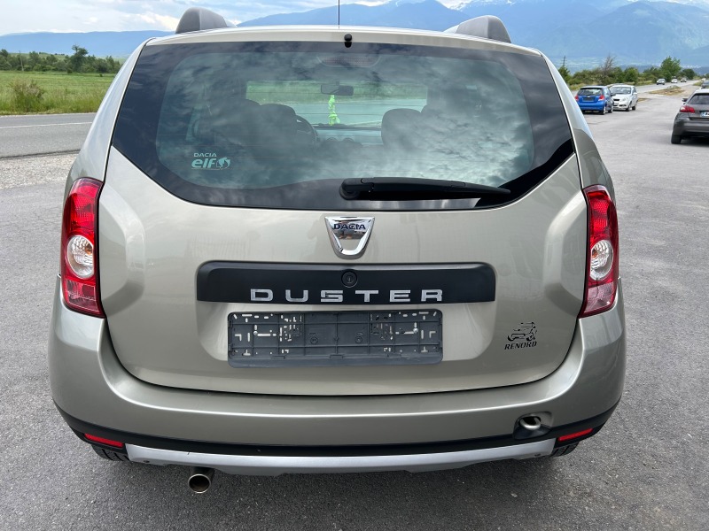 Dacia Duster 1.6i Laureate, снимка 5 - Автомобили и джипове - 41001950
