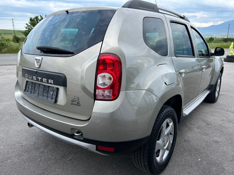 Dacia Duster 1.6i Laureate, снимка 6 - Автомобили и джипове - 41001950