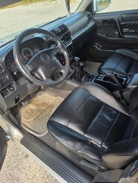 Opel Frontera 2.2 136 газ/бензин , снимка 10