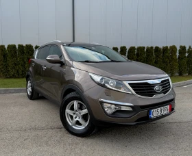 Kia Sportage 2.0 CRDI 4x4  - 8900 € / 17406.89 лв. - 27123974 3