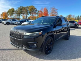 ������ Jeep Cherokee