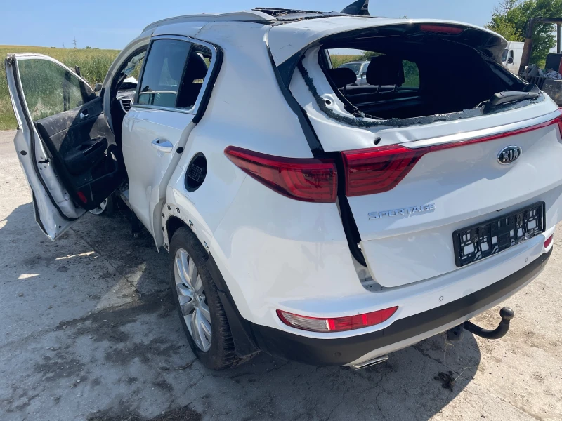 Kia Sportage 2.0 CRDI, снимка 5 - Автомобили и джипове - 50774467
