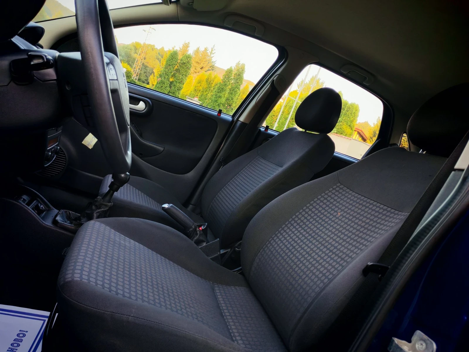 Opel Corsa 1.2I 16V(75)* FACELIFT* КЛИМАТРОНИК* НОВ ВНОС* , снимка 12 - Автомобили и джипове - 55657795