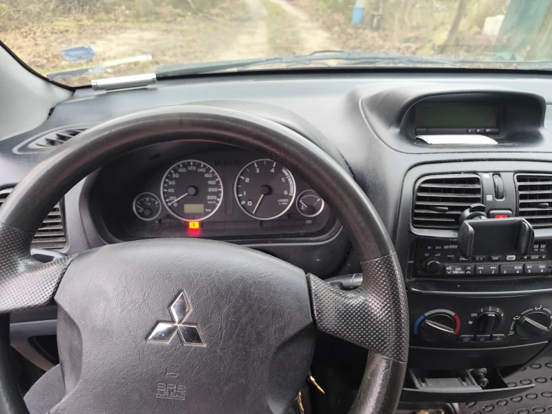 Mitsubishi Space star, снимка 13 - Автомобили и джипове - 52885597