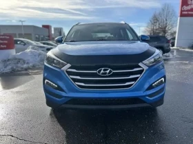 Hyundai Tucson / Premium / AWD / Keyless / Подгреви / CARFAX  - 14300 € / 27968.37 лв. - 98415017 2