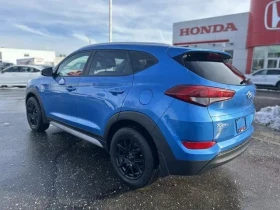 Hyundai Tucson / Premium / AWD / Keyless / Подгреви / CARFAX  - 14300 € / 27968.37 лв. - 98415017 7