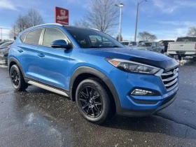 Hyundai Tucson / Premium / AWD / Keyless / Подгреви / CARFAX  - 14300 € / 27968.37 лв. - 98415017 3