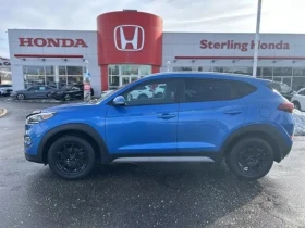 Hyundai Tucson / Premium / AWD / Keyless / Подгреви / CARFAX  - 14300 € / 27968.37 лв. - 98415017 8