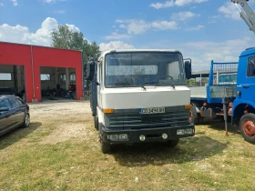 Nissan L80.14 Самосвал, снимка 15