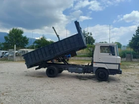 Nissan L80.14 Самосвал, снимка 3
