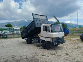 Nissan L80.14 Самосвал, снимка 1