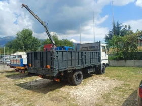 Nissan L80.14 Самосвал, снимка 13